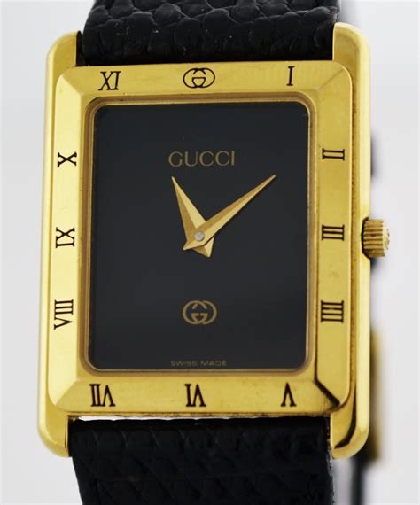 gucci gold tone black dial swiss quartz watch|gucci quartz watch women's vintage.